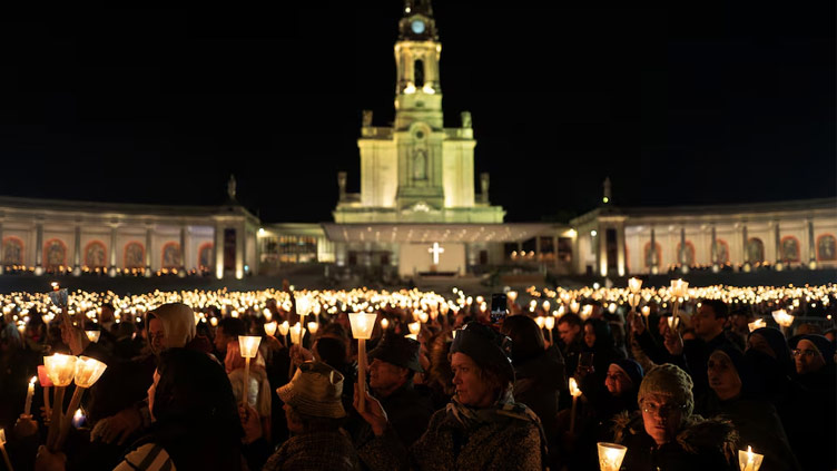 Some 270,000 pilgrims pray for Pope Leo and peace in Portugal's Fatima shrine