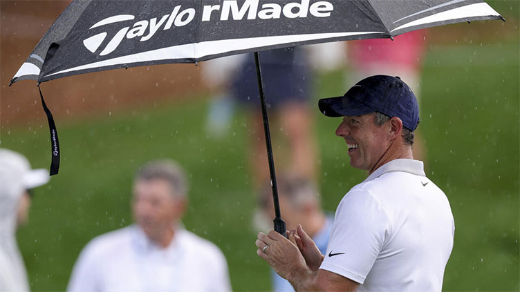 McIlroy, Scheffler and Schauffele together for rainy PGA battle