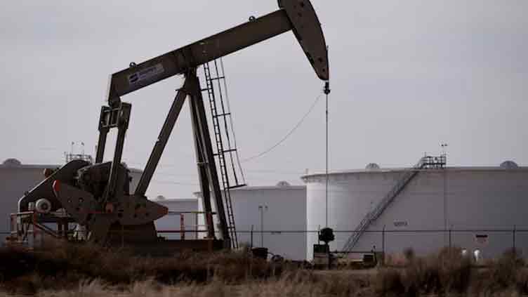 Oil prices hold near two-week highs on trade war reprieve, weaker dollar