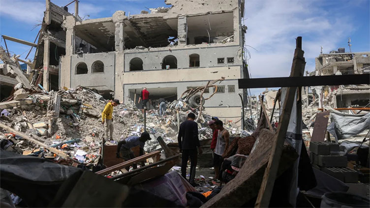 Gaza strikes kill 120 as Hamas says aid entry 'minimum requirement' for talks