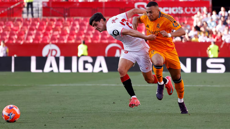 Mbappe and Bellingham give Real Madrid 2-0 win over nine-man Sevilla