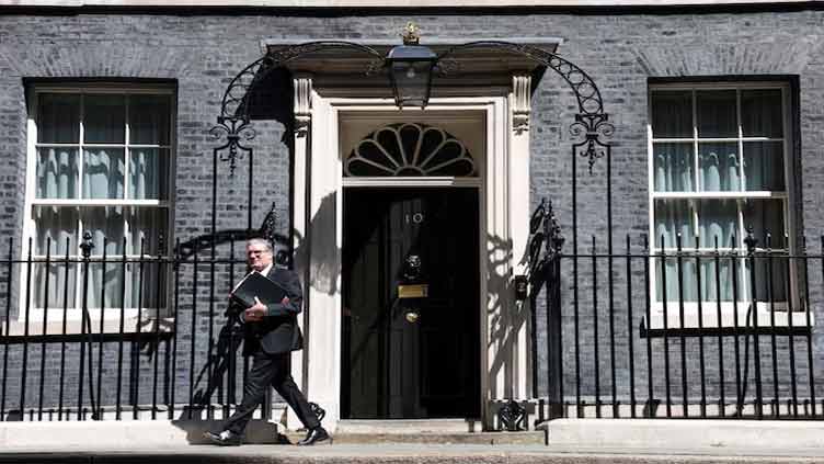 UK police arrest third man over fire at PM Starmer's house