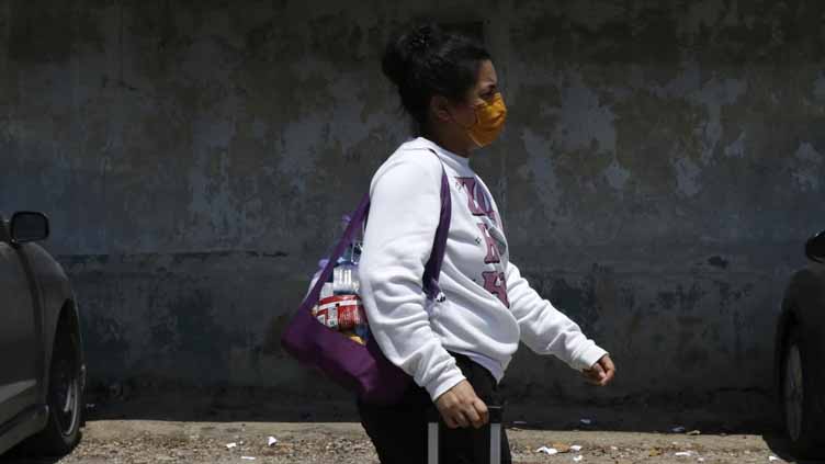 US sends 68 migrants back to Honduras and Colombia in first voluntary deportation