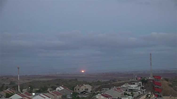 Multiple blasts rock Gaza, seen from southern Israel