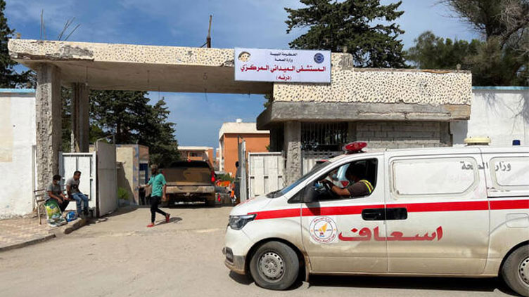 At least 58 corpses found in Libyan hospital, ministry says