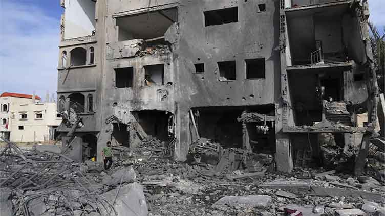 Strikes on Gaza kill at least 60, local officials say, as criticism against Israel mounts