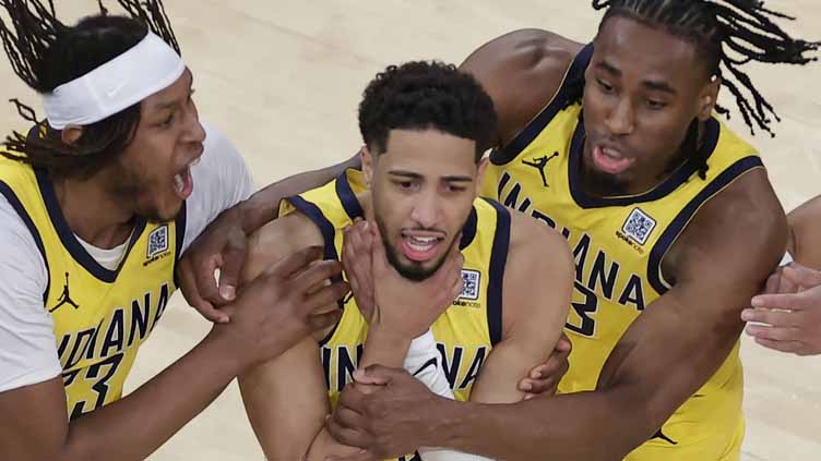 Pacers tie it on Haliburton's jumper at buzzer, then beat Knicks 138-135 in OT of East finals Game 1