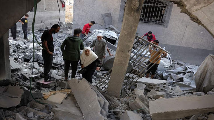 Gaza rescuers say more than 50 killed as Israel orders evacuations