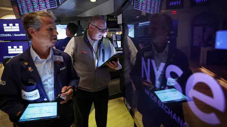 Wall St falls as Trump tariff threats spark market uncertainty