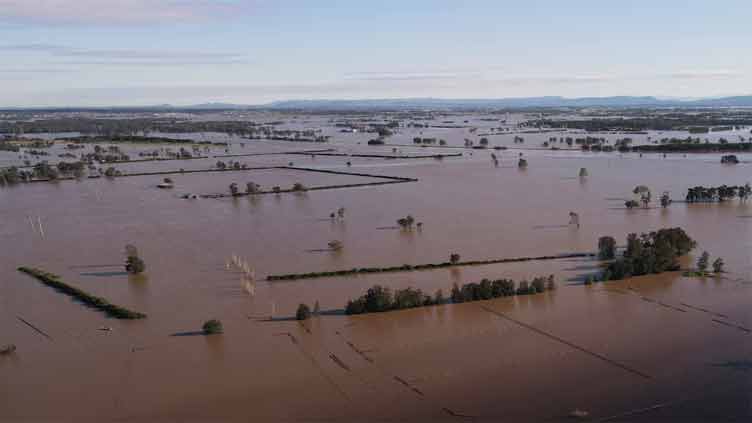 Australia begins clean-up after floods kill 5, damage 10,000 properties