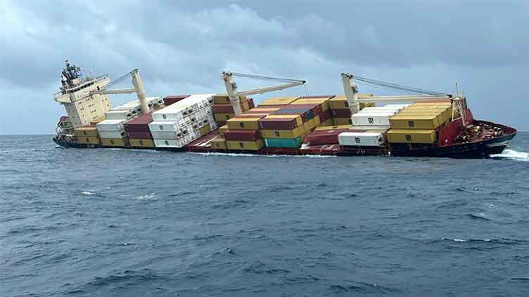 Crew rescued as container ship sinks off India's south coast with hazardous cargo