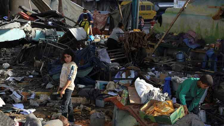 Gaza aid plan makes faltering start as airstrikes kill dozens