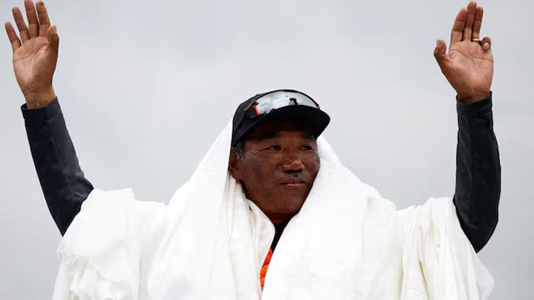 Nepali Sherpa scales Mount Everest for a record 31st time