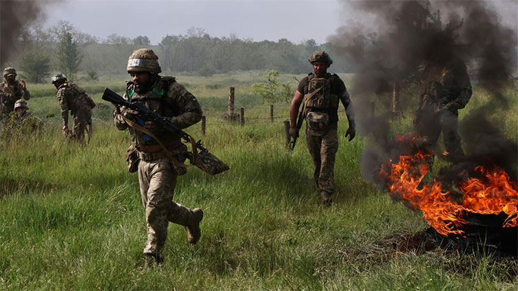 Russia accuses Ukraine of trying to derail peace talks