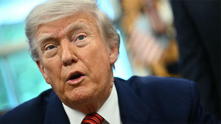 Trump says Putin 'playing with fire' as sanctions pressure grows