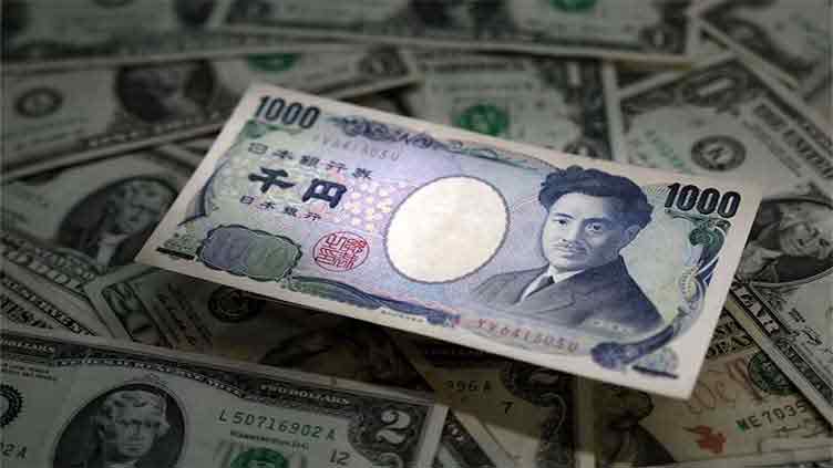Yen shrugs off tepid bond demand, dollar firms on trade deal hopes