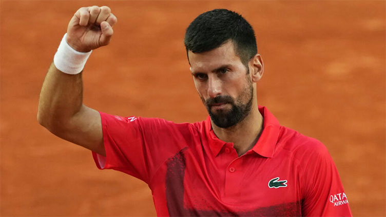 Djokovic rolls past Moutet to reach French Open last 32