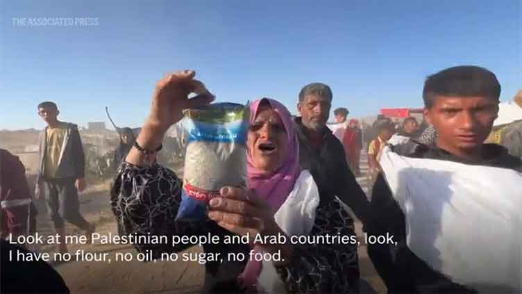 Chaos and deadly gunfire erupt again as starving Palestinians seek food at new distribution sites