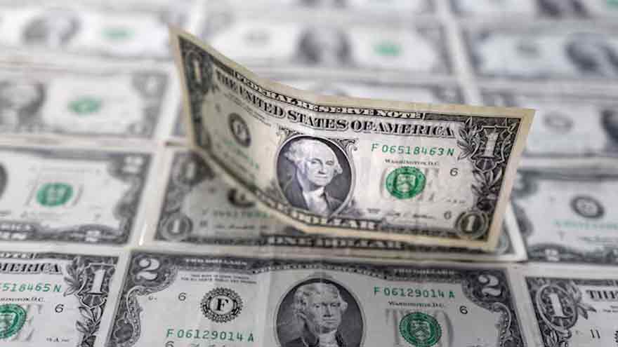 Dollar flirts with three-month peak as investors look to US data releases