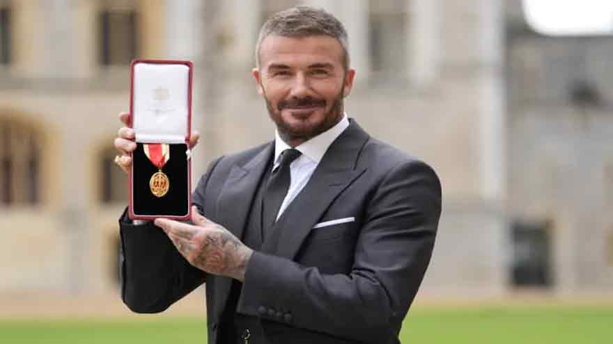 David Beckham knighted for services to sport and charity