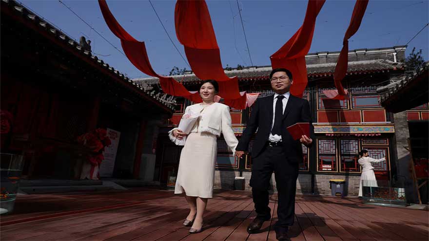 In China, wedding bells are ringing in nightclubs, a subway station and on snowy mountain peaks