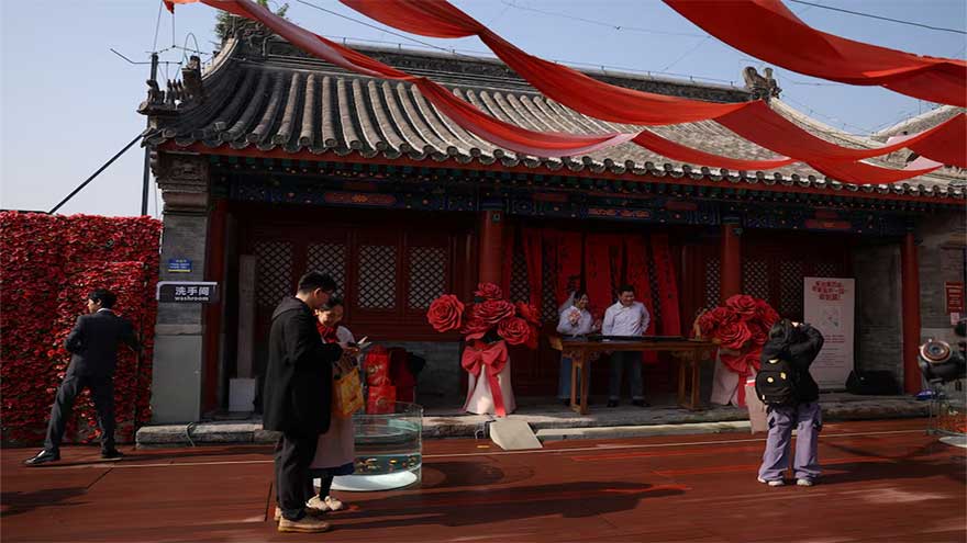 In China, wedding bells are ringing in nightclubs, a subway station and on snowy mountain peaks