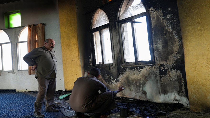 Israeli troops kill two West Bank Palestinians, settlers set mosque ablaze