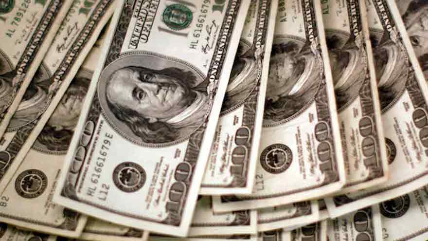Dollar steady as investors eye release of US data backlog