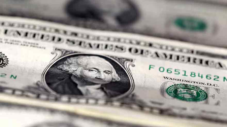 Dollar retreats, kiwi leaps as rate direction diverges