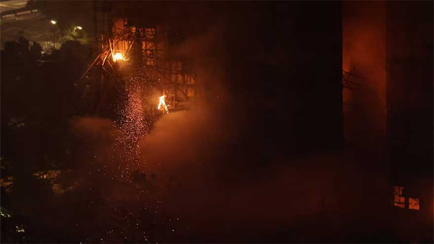 Hong Kong fire kills 55, hundreds missing as police blame 'grossly negligent' construction firm