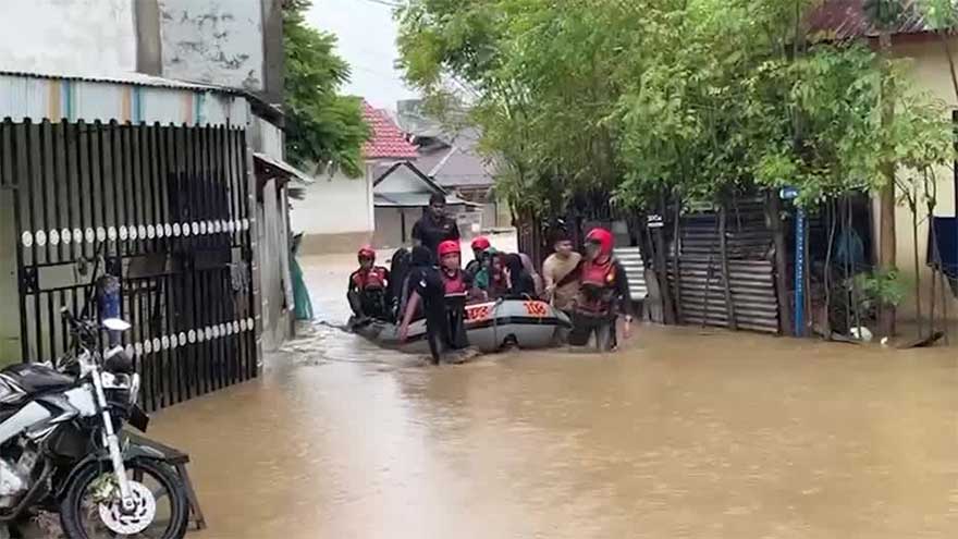 Cyclone, floods in Indonesia kill at least 46 as rescuers race to reach survivors