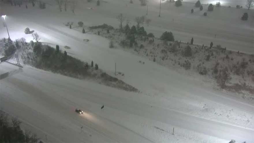 Heavy snow blankets roads in Michigan as winter storm hits Midwest