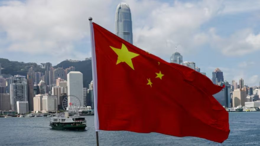 China holds National Day ceremony in waters off atoll claimed by Philippines