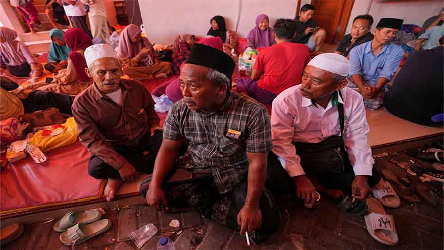 Rescuers turn to heavy machinery as hope fades of finding survivors of Indonesia school collapse