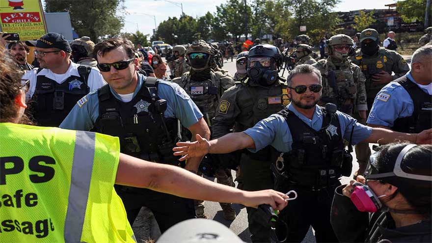 Border Patrol agents shoot armed woman in Chicago as protesters confront immigration personnel
