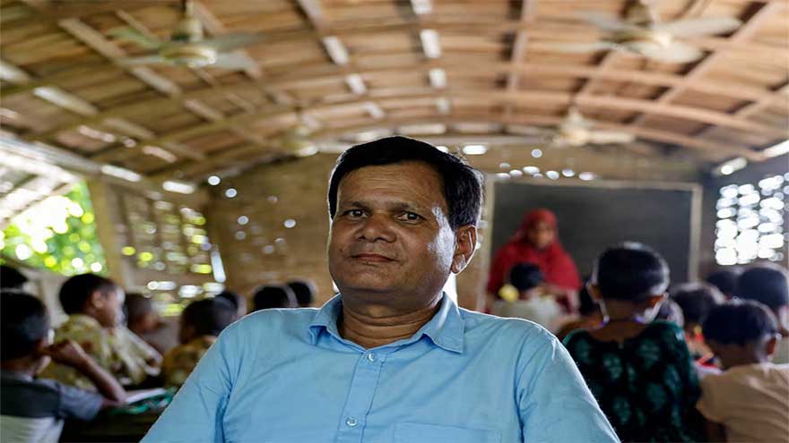 In Bangladesh's flooded plains, schools in boats keep learning afloat