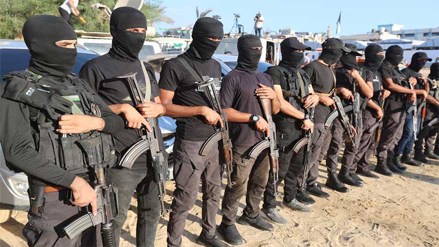 Hamas deploys fighters as hostages released, in show of strength