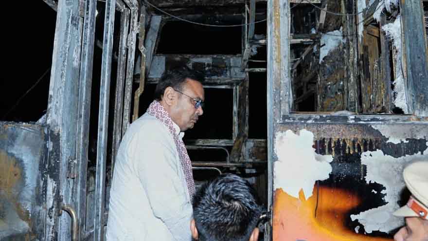 A passenger bus in northern India catches fire and burns at least 20 people to death