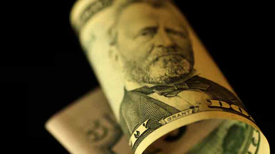 Dollar under pressure on Fed rate cut bets, China trade tensions
