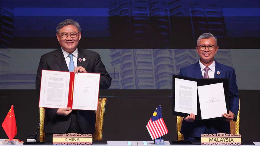China and ASEAN, hit by US tariffs, sign upgraded free trade pact