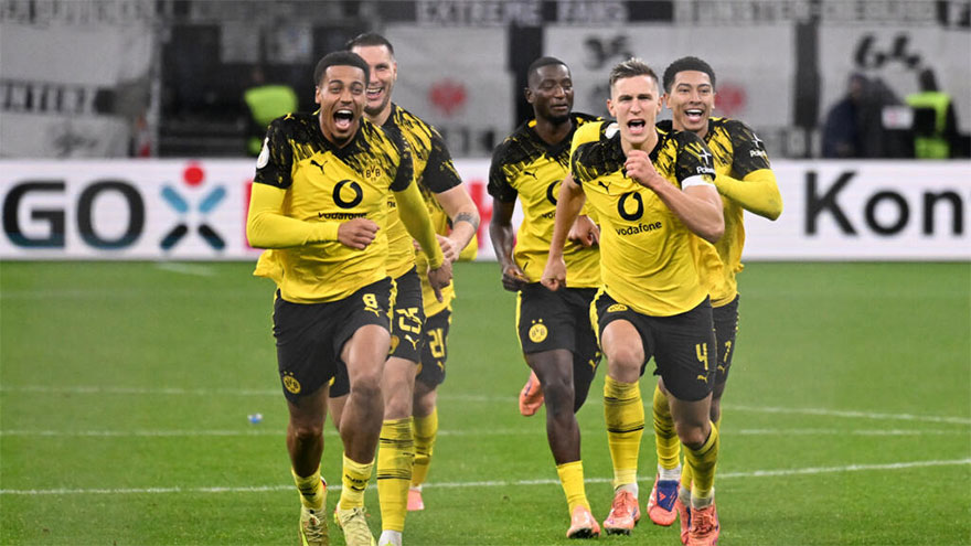 Dortmund knock Frankfurt out of German Cup on penalties