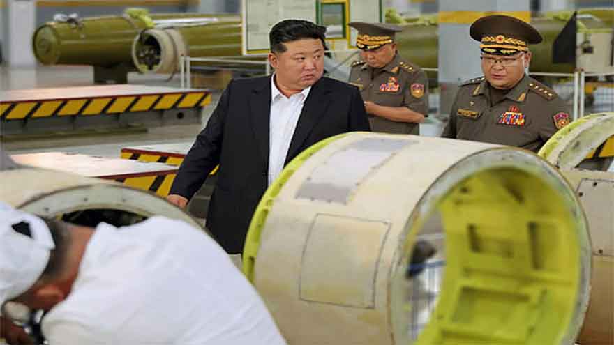 North Korean leader inspects new missile factory ahead of visit to China