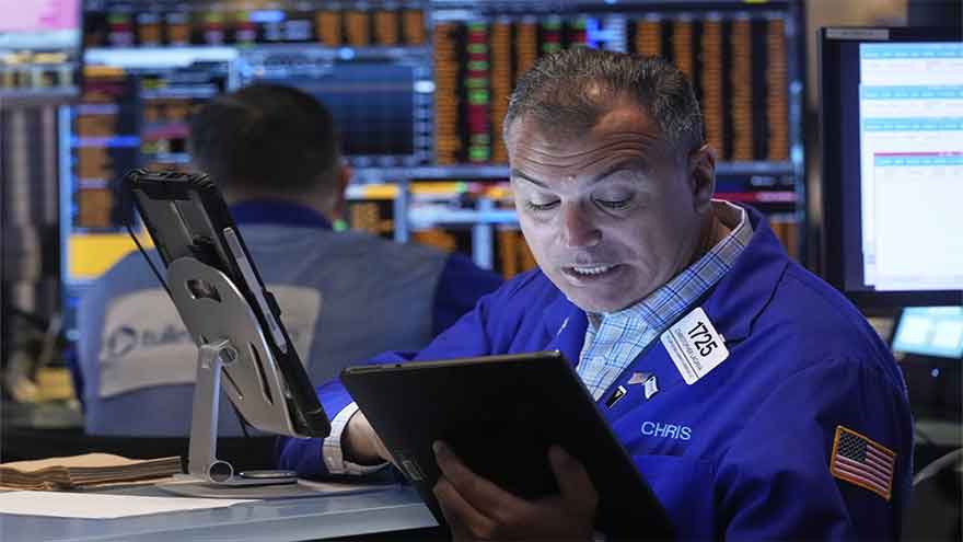 Wall Street pulls further from its records under the weight of pressure from the bond market