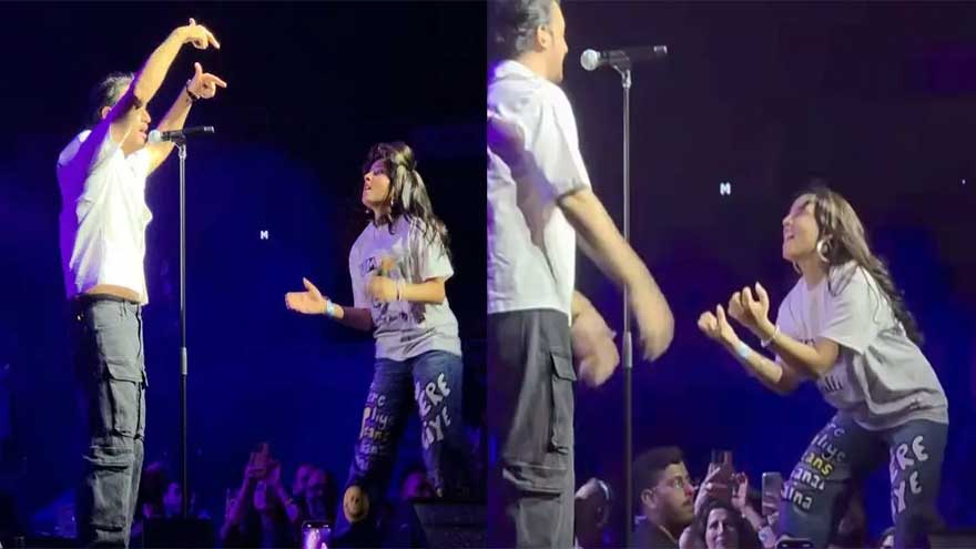Fan interrupts Atif Aslam by dancing on stage