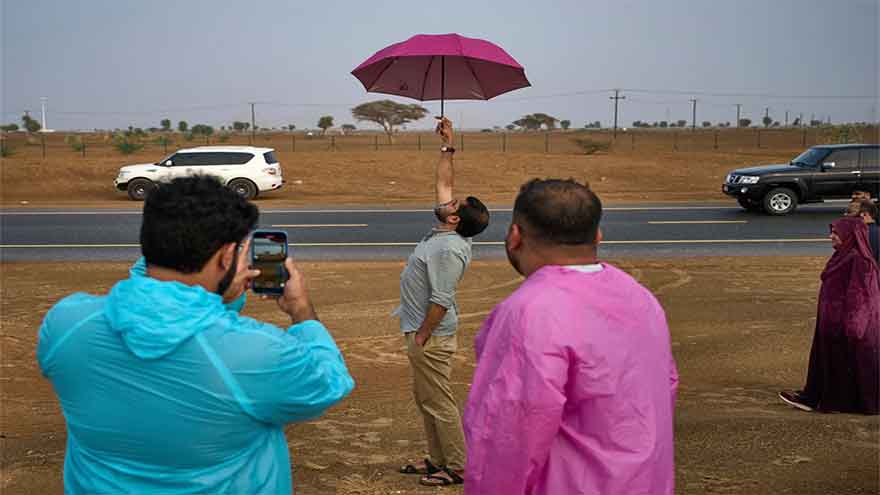 Promise and peril drive the fascination with rain in the parched deserts of the United Arab Emirates