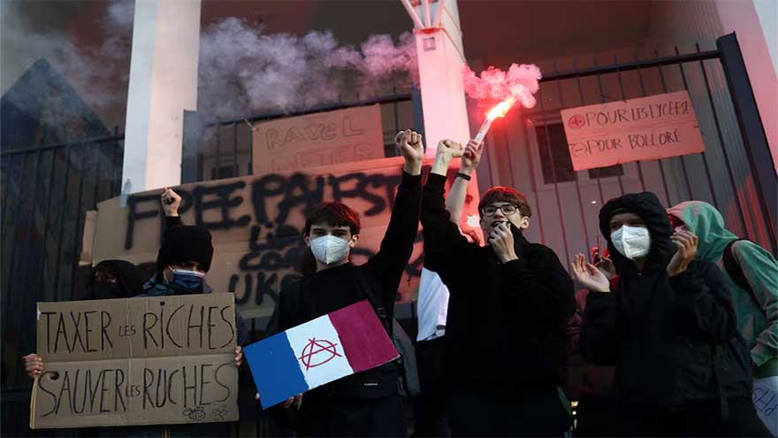 French unions strike against austerity, pressuring Macron