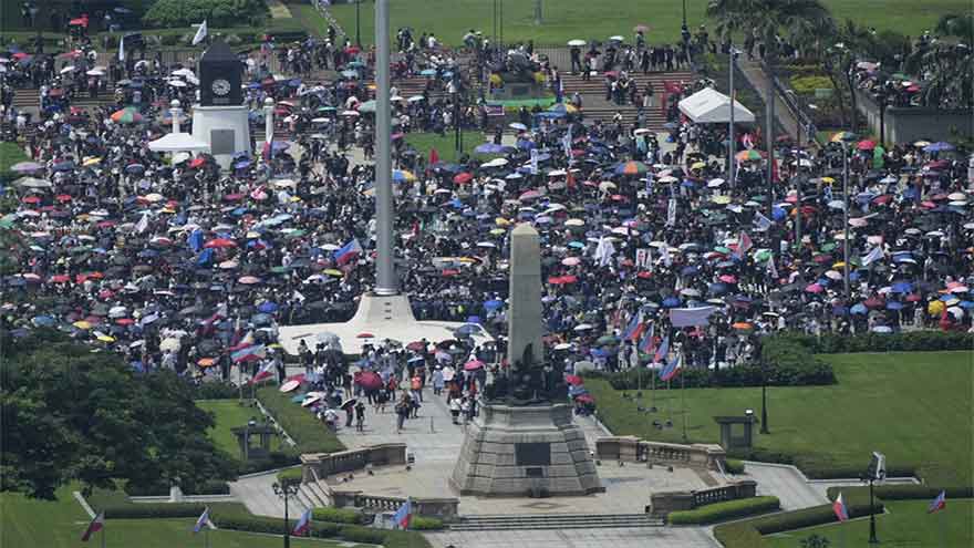 Philippine police arrest 17 for hurling rocks as thousands peacefully protest corruption
