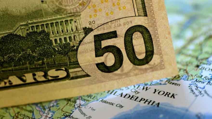 Dollar on defensive despite Powell's caution on further easing