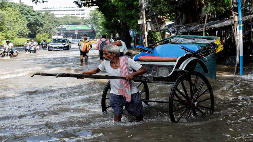 At least 12 dead as record rain floods India's Kolkata
