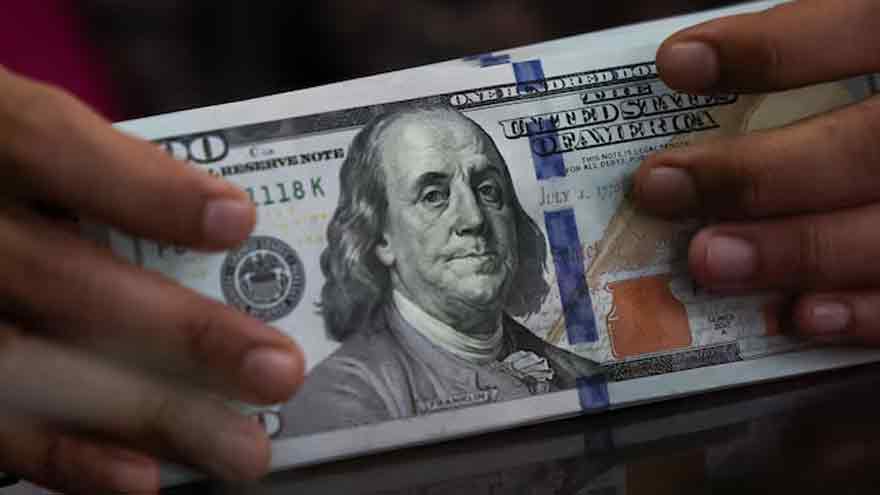 Dollar stays strong as Fed rate cut wagers wobble, data in focus